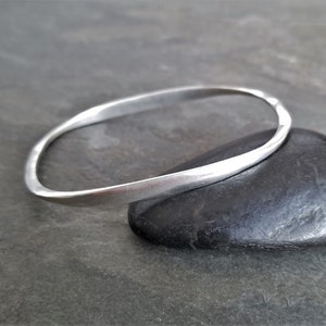 Oval bangle bracelet, oxidized silver bangle, imperfect texture, asymmetrical bracelet, unusual shape, stacking bangle