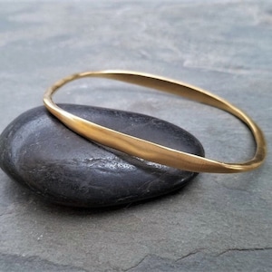 Oval bangle bracelet, gold stacking bangle, asymmetrical bracelet,  imperfect texture, unusual shape, 14k gold satin finish over .925 silver