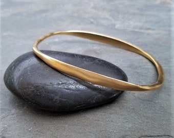 Oval bangle bracelet, gold stacking bangle, asymmetrical bracelet,  imperfect texture, unusual shape, 14k gold satin finish over .925 silver