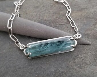 Aqua kyanite elongated hexagon pendant necklace, claw prong setting and silver paperclip chain, lightly oxidized