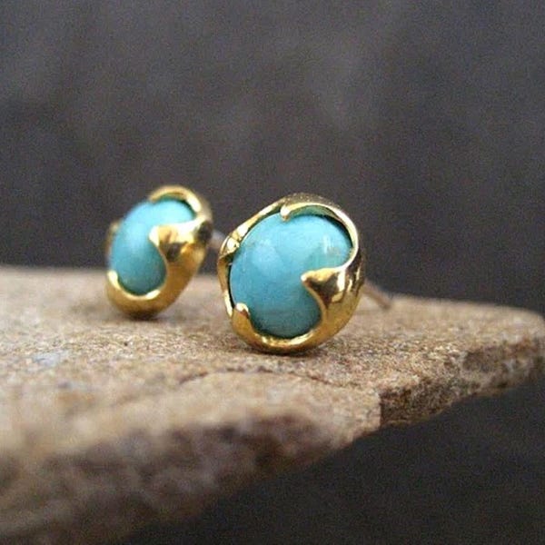 Genuine turquoise stud earrings set in a thorn prong setting