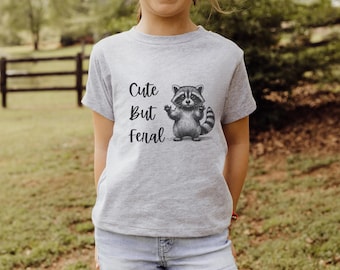 キュートだけど野生的なアライグマのキッズTシャツ、ユースグラフィックシャツ