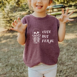Toddler Short Sleeve Tee, Cute But Feral Graphic T-Shirt Kids Halloween Shirt Playful Toddler Apparel Funny Kids Tee Matching Family Apparel
