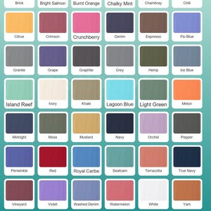 May include: A color chart featuring 36 different solid colors, including shades of blue, green, red, and neutral tones. The text "COMFORT COLOR T SHIRT" is displayed at the bottom.