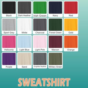May include: A color chart showcasing a variety of sweatshirt colors, including black, navy, red, and green. The chart displays swatches of each color with their names, such as "Sport Grey," "White," and "Orange." The word "SWEATSHIRT" is displayed at the bottom.