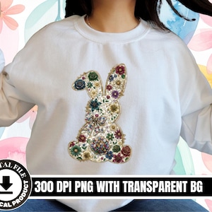 May include: White sweatshirt with a floral bunny design. The bunny is decorated with colourful flowers and leaves. The text "DIGITAL FILE" and "300 DPI PNG WITH TRANSPARENT BG" are printed on the bottom of the image.