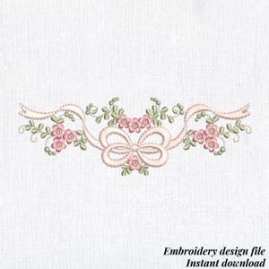 May include: An embroidery design featuring a pink ribbon with a bow and floral accents. The design includes pink flowers and green leaves, with the text "Embroidery design file Instant download" at the bottom.