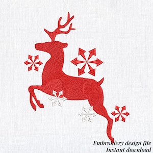 May include: A red embroidered reindeer design with snowflakes on a white background. The reindeer is leaping, surrounded by red and white snowflakes. Text at the bottom reads "Embroidery design file Instant download".