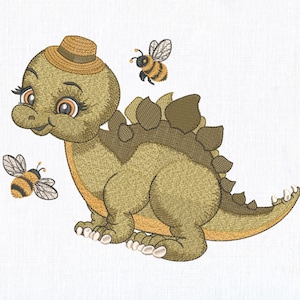 Può includere: Design ricamato con un dinosauro verde sorridente con un cappello marrone e due api. Il dinosauro ha grandi occhi. Il design è su sfondo bianco. Ideale per articoli per bambini.