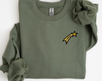 Sudadera unisex con cuello redondo y bordado de estrella fugaz.