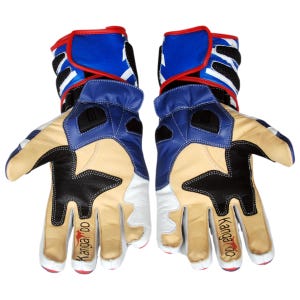 May include: A pair of motorcycle gloves with a color-blocked design. The gloves feature blue, white, black, and tan leather panels. The cuffs are blue with white stars and red trim. The word "Kangaroo" is printed on the side of each glove.