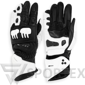 Könnte beinhalten: Paar schwarze und weiße Motorradhandschuhe. Die Handschuhe bestehen aus einer Kombination aus schwarzem Leder und weißen Akzenten, mit Schutzpolstern an Knöcheln und Handgelenk. Das Design umfasst Belüftung für den Luftstrom und einen sicheren Handgelenkverschluss.