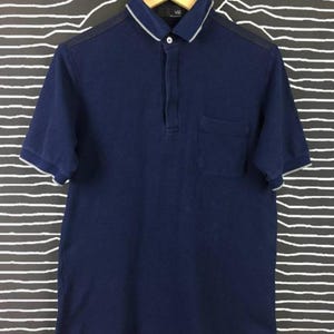 Vintage uniqlo x undercover polo shirt