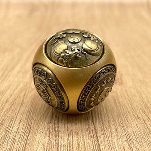 Mini Brass Rotating Ball Figurine – Vintage Copper Six-Sided Fortune Spinner with Taichi and Lucky Symbols – Zen Decor and Fidget Toy
