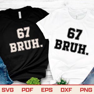 May include: Two t-shirts, one black and one white, each with the text "67 BRUH." in a collegiate-style font. The black shirt has a white outline on the text, while the white shirt has a black outline. The bottom of the image shows file type options.