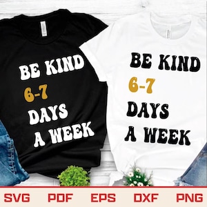 May include: Two t-shirts, one black and one white, each displaying the text "BE KIND 6-7 DAYS A WEEK" in a retro font. The numbers "6-7" are in mustard yellow. These are casual wear t-shirts.