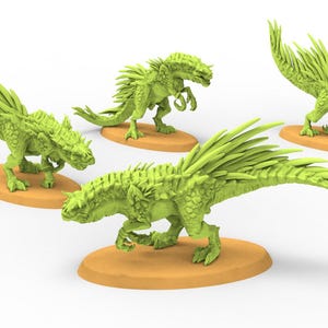 May include: Four green dinosaur figurines with spiky backs and tails, posed on tan circular bases. The dinosaurs have detailed textures and are in various action poses, suggesting a fantasy or gaming theme.