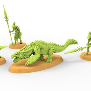 May include: A collection of green fantasy miniatures, including a large reptilian creature and three humanoid figures with spears. The figures and creature are on tan bases, set against a white background.