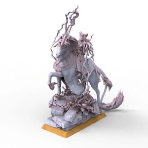 May include: A detailed sculpture of a figure riding a horse, with intricate details. The sculpture is primarily light blue with pink accents, mounted on a base with a gold-colored edge. The horse is rearing up, and the rider is adorned with ornate details.
