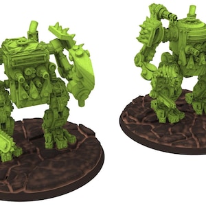 May include: Two green, detailed miniature robot figures, each standing on a brown, textured base. The robots have multiple weapons, including a chainsaw and cannons. The figures are designed with a mechanical aesthetic, perfect for tabletop gaming or display.