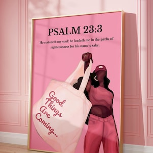 May include: A framed art print with a pink background and gold frame. The print features the text "PSALM 23:3" and a quote. A graphic of a person holding a tote bag with the words "Good Things Are Coming..." is also included.