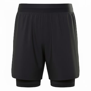 Puede incluir: Pantalones cortos deportivos negros con una capa de compresión integrada. Los pantalones cortos tienen una cintura ancha y elástica y un diseño aerodinámico. Estos pantalones cortos para correr están diseñados para la comodidad y el rendimiento durante los entrenamientos.