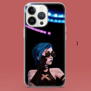 May include: A clear phone case with a graphic of a character with blue hair, goggles, and a black outfit. The background is black with blue and purple accents. The case has a clear border and a red background.