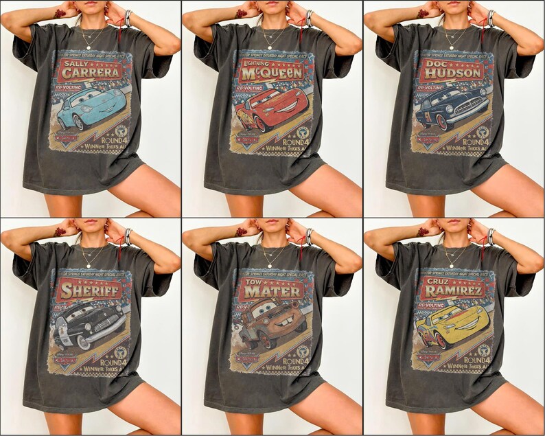 May include: Six dark gray t-shirts featuring different characters from the movie Cars. Each shirt has a vintage-style graphic with the character's name and a racing theme. The characters include Sally Carrera, Lightning McQueen, Doc Hudson, Sheriff, Tow Mater, and Cruz Ramirez.