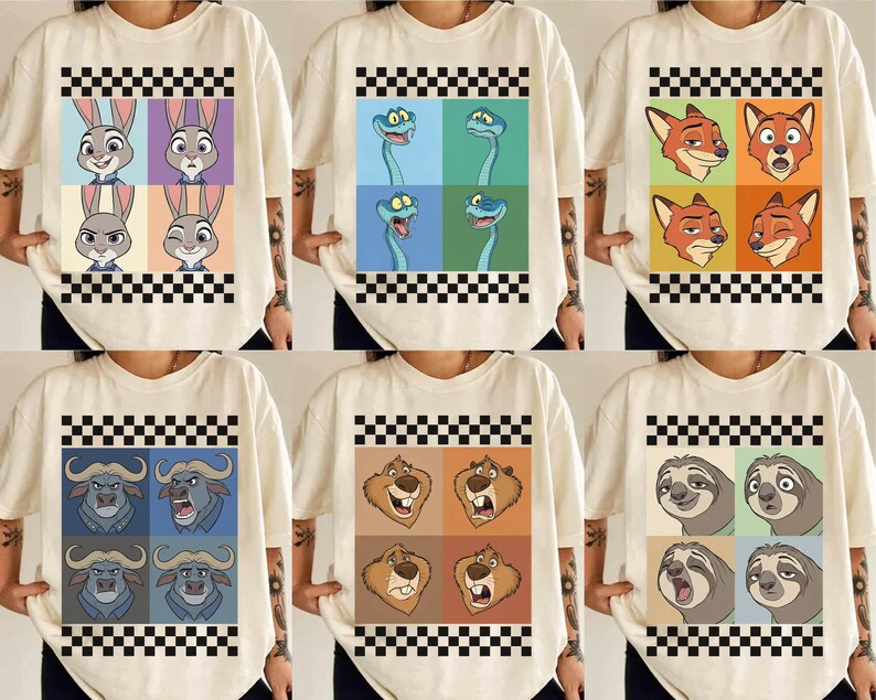 May include: Cream-coloured t-shirts with cartoon character designs. Each shirt features a different design, including rabbits, snakes, foxes, buffalo, bears, and sloths. The designs are set within a checkered border.