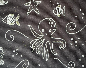 Jerseystof “Underwater Doodle” – oceaanmotieven wit op blauw – sweatjersey katoen elastaan