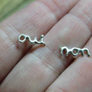 oui non stud earrings