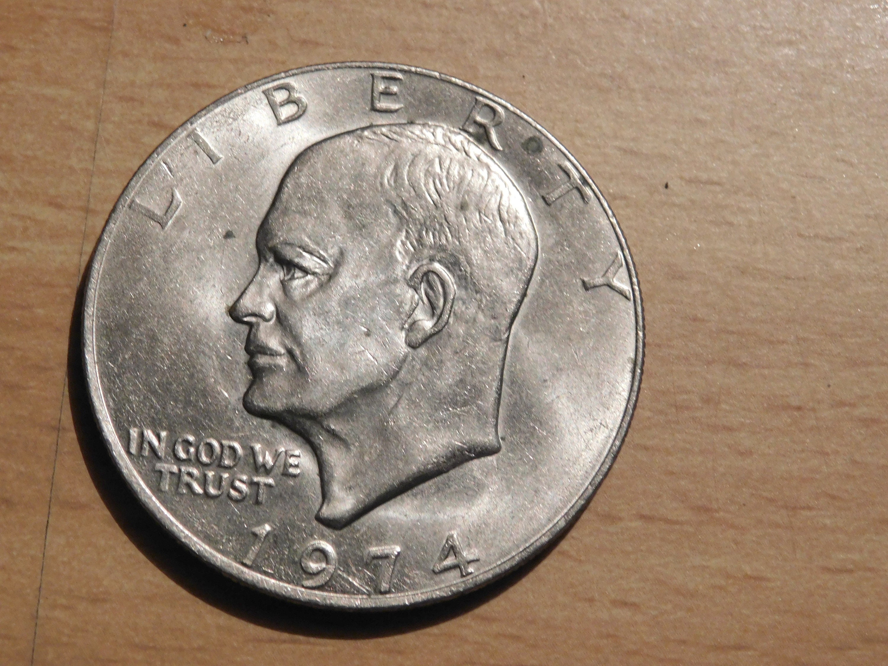 希少1974 KEATS AND EMBARRASSMENT 1971 - 1974 Eisenhower Silver Dollars - 4 Uncirculated / 4
