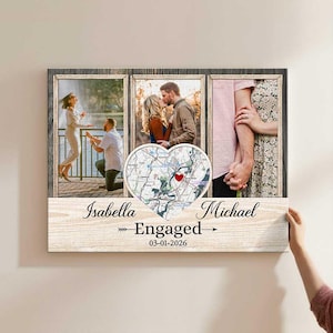 May include: A framed canvas print featuring three photographs and a heart-shaped map. The photos depict a proposal and a couple holding hands. The text "Isabella", "Michael", "Engaged", and the date 03-01-2026 are displayed.