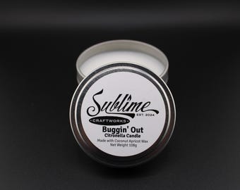 Citronella Scented Candle in a simple silver tin, making it easy to take with you or use just about anywhere.