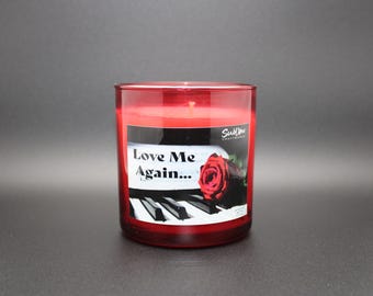 Scented Candle crisp blend of lemon and green notes, freesia, geranium,  eucalyptus, base of musk, sandalwood, cedarwood, moss, and amber.