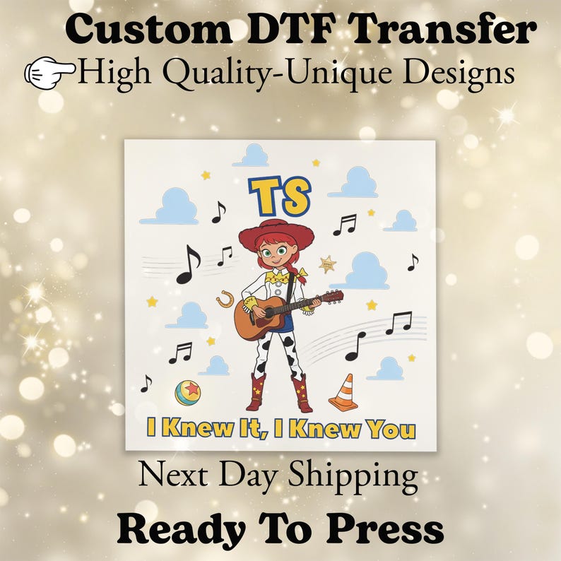 May include: A custom DTF transfer featuring a cartoon cowgirl character playing an acoustic guitar. The design includes the text TS, musical notes, blue clouds, a ball, and a traffic cone, with the phrase I Knew It, I Knew You at the bottom.