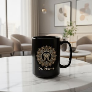 May include: Black ceramic mug with a gold and brown mandala design and a tooth at the centre. The mug has the text "Dr. Name" in gold. A dental-themed product.