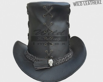 May include: Black leather hat with a top hat style crown and a wide brim. The hat features a braided band with a skull accent and lace-up detailing. The text "Wild Leatherz" is visible on the upper right.