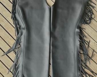 Handmade Black Leather Fringe Chaps – Western Cowboy Riding Chaps with Tooled Accents, Durable Cowhide Gear for Rodeo & Horse Riding