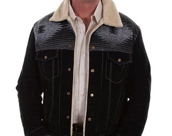May include: Black denim jacket with a cream-colored shearling collar and a patterned yoke. The jacket has button closures, chest pockets, and a light-colored shirt underneath. The image also includes the text "FREE DELIVERY".