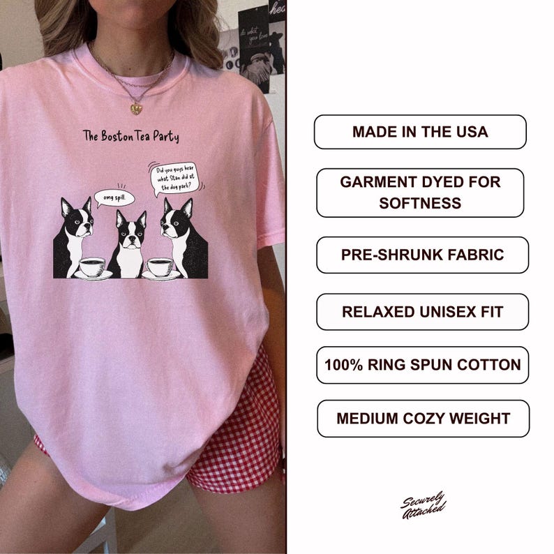 May include: Pink t-shirt with the text "The Boston Tea Party" and a cartoon of three Boston Terriers with teacups. The shirt has a relaxed unisex fit and is made of 100% ring-spun cotton.