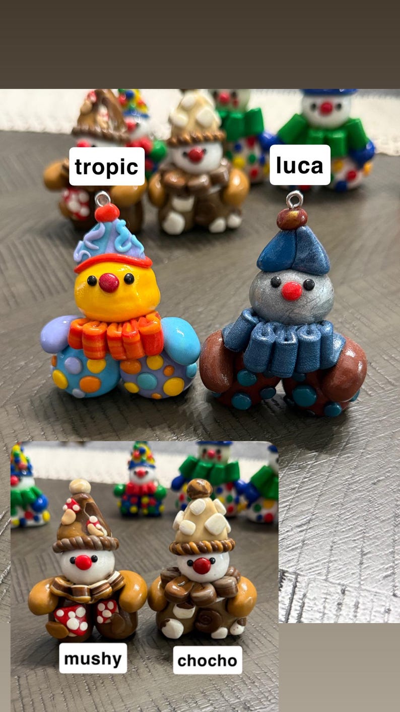 May include: A collection of small, colourful clown figurines with metal loops for hanging. The figures feature distinct designs labelled as tropic, luca, mushy, and chocho, showcasing various hats, ruffled collars, and polka-dot patterns in vibrant colours.