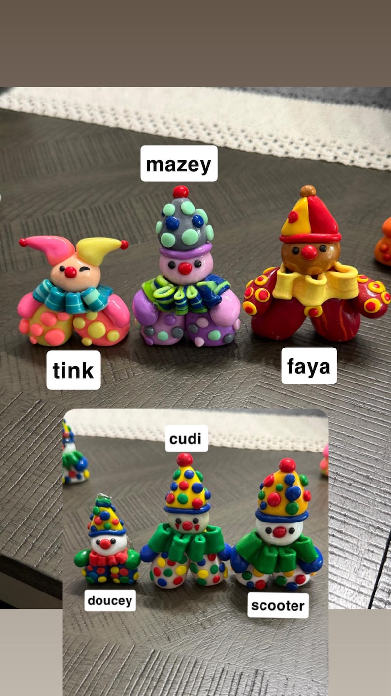 May include: Six small, colourful clay clown figurines labelled with names. Top row: Tink, Mazey, and Faya. Bottom row: Doucey, Cudi, and Scooter. Each clown features a unique hat, ruffled collar, and polka-dot pattern in vibrant shades of red, yellow, blue, green, and purple.