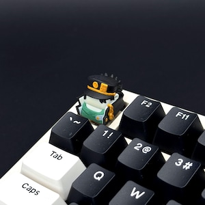 Capuchon de touche artisanal JoJo Anime Hero, capuchon Jo.taro personnalisé peint à la main pour clavier mécanique, oeuvre d'art unique en résine ESC, cadeau Ora Ora pour lui ou un joueur