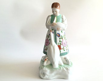 8" Herend porcelain girl figurine feeding geese. Hand painted in Hungary 5555. Hungarian figure with birds and floral folk dress.