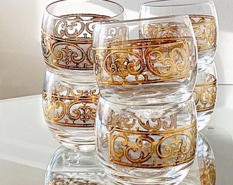 4  Roly poly rocks cocktail glasses. Georges Briard embossed Spanish Gold scroll glassware, Glam mid century whiskey bar glasses.