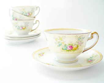 Pink and Yellow rose fine china tea cup and saucer set. Vintage teacup with floral swags hand painted in Japan early 1960s