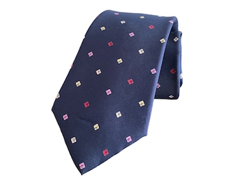 Vtg Yves Saint Laurent navy blue silk tie. Classic 3/25" repp necktie w/ geometric pastel polka dots. Designer neckwear for spring & summer