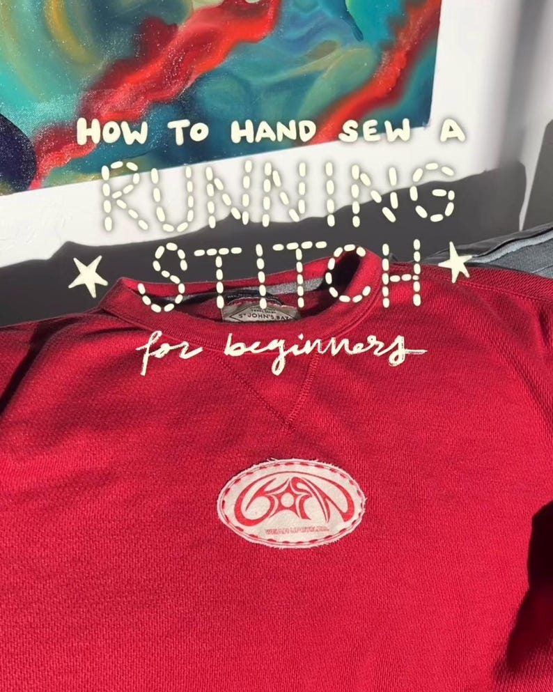 May include: A red sweatshirt with the text "HOW TO HAND SEW A RUNNING STITCH for beginners" in white. The sweatshirt has a white and red patch on the front.