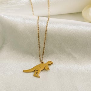 Colar de dinossauro T-Rex: pingente de dinossauro em aço inoxidável dourado ou prateado